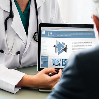 Image of clinician sharing information with client. 